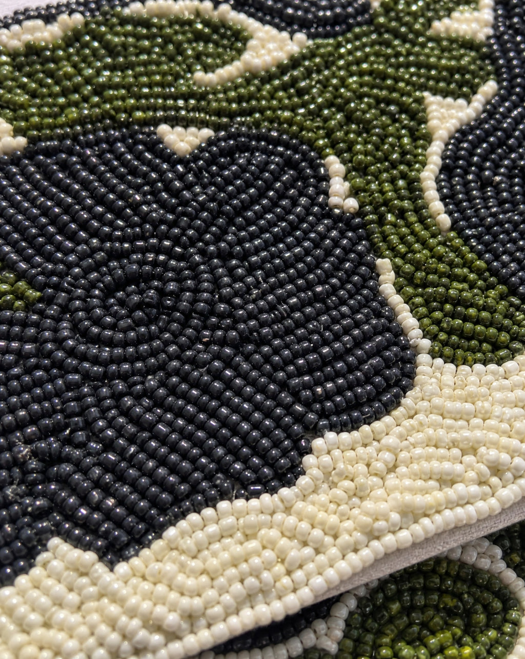Botanica ivory beaded envelope bag - close-up detail of black and olive seed bead beadwork