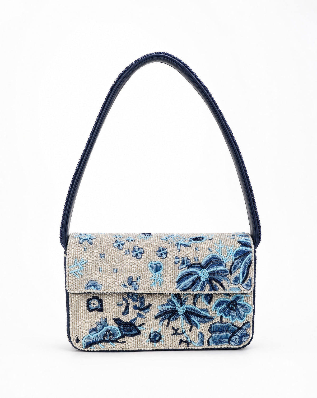 Kooks blue floral beaded shoulder bag - front view showing scattered blue botanical beadwork on ivory ground with navy beaded strap