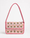 Kildare pink lattice floral beaded shoulder bag - front view showing intricate blush pink beadwork with striped beaded strap