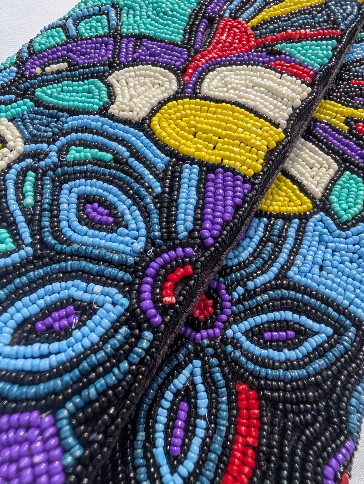 Hummingbird beaded envelope bag - close-up detail of multicolour seed bead beadwork